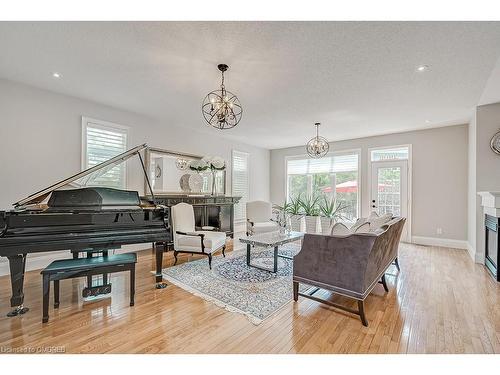 2-128 Morden Road, Oakville, ON - Indoor Photo Showing Living Room With Fireplace