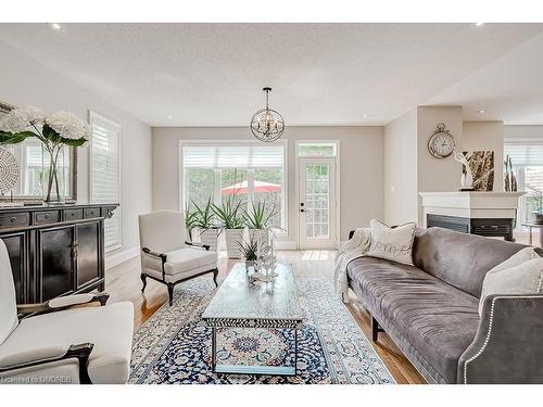 2-128 Morden Road, Oakville, ON - Indoor Photo Showing Living Room With Fireplace