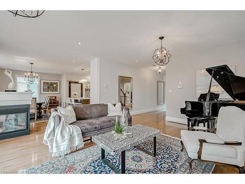 2-128 Morden Road, Oakville, ON - Indoor Photo Showing Living Room With Fireplace