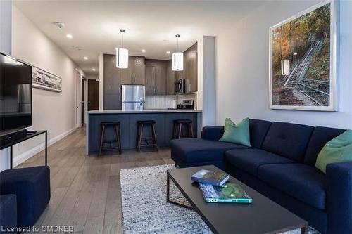 207-101 Locke Street S, Hamilton, ON - Indoor Photo Showing Living Room