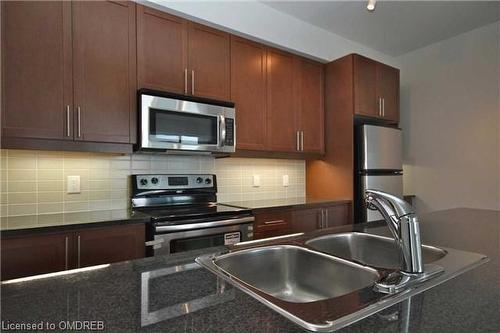 1404-1 Hurontario Street, Mississauga, ON - Indoor Photo Showing Kitchen With Double Sink