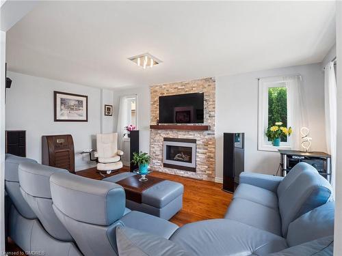 2215 Springfield Court, Mississauga, ON - Indoor Photo Showing Living Room With Fireplace