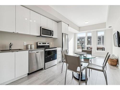 202-1440 Clarriage Court, Milton, ON - Indoor Photo Showing Kitchen