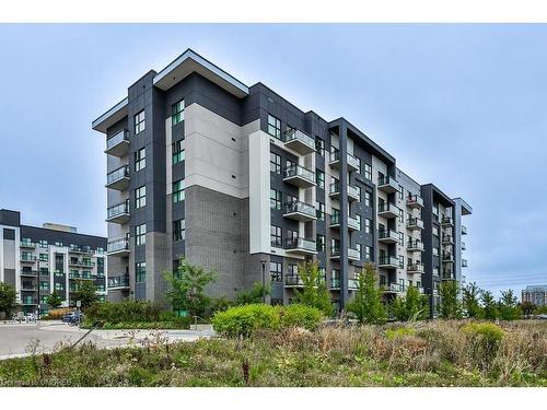 423-102 Grovewood Common, Oakville, ON - Outdoor With Balcony With Facade