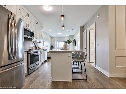 423-102 Grovewood Common, Oakville, ON - Indoor Photo Showing Kitchen With Stainless Steel Kitchen With Upgraded Kitchen