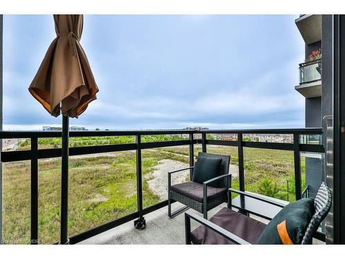 423-102 Grovewood Common, Oakville, ON - Outdoor With Balcony With View With Exterior