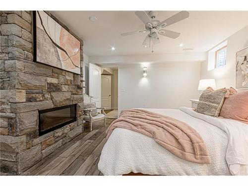 1227 Nathaniel Crescent, Burlington, ON - Indoor Photo Showing Bedroom With Fireplace