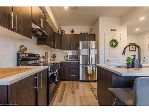 202-6591 Montrose Road, Niagara Falls, ON - Indoor Photo Showing Kitchen With Stainless Steel Kitchen With Upgraded Kitchen