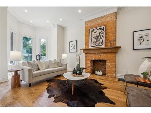 18 Earnbridge Street, Toronto, ON - Indoor Photo Showing Living Room With Fireplace