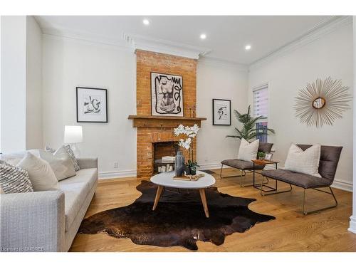 18 Earnbridge Street, Toronto, ON - Indoor Photo Showing Living Room With Fireplace