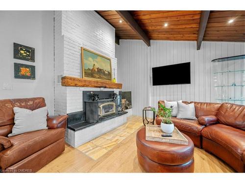 9256 First Line, Milton, ON - Indoor Photo Showing Living Room With Fireplace