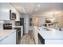 106-3058 Sixth Line, Oakville, ON  - Indoor Photo Showing Kitchen With Stainless Steel Kitchen With Double Sink With Upgraded Kitchen 