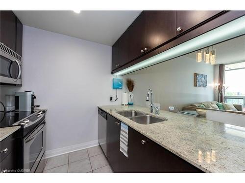 710-1055 Southdown Road, Mississauga, ON - Indoor Photo Showing Kitchen With Double Sink