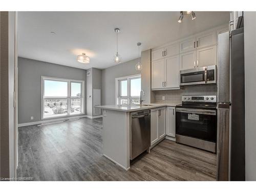 417-102 Grovewood Common, Oakville, ON - Indoor Photo Showing Kitchen With Stainless Steel Kitchen With Upgraded Kitchen