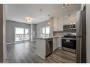 417-102 Grovewood Common, Oakville, ON  - Indoor Photo Showing Kitchen With Stainless Steel Kitchen With Upgraded Kitchen 