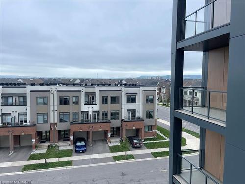 401-1440 Clarriage Court, Milton, ON - Outdoor With Balcony