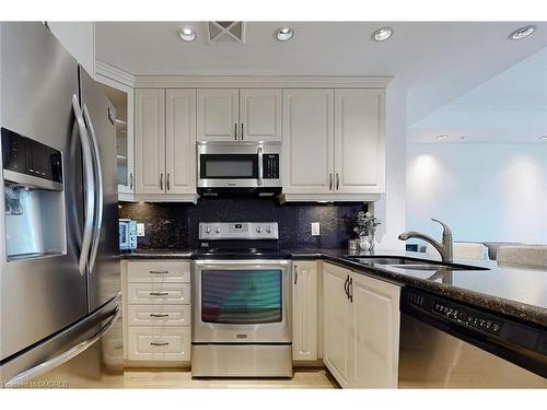 304-205 Lakeshore Road W, Oakville, ON - Indoor Photo Showing Kitchen With Stainless Steel Kitchen With Double Sink