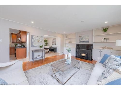 13055 Fourth Line Line, Nassagaweya, ON - Indoor Photo Showing Living Room With Fireplace