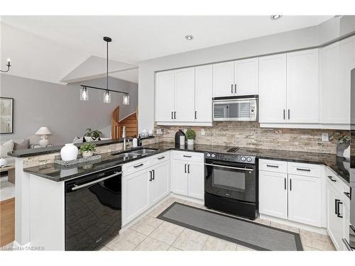 56 Bardoe Crescent, Milton, ON - Indoor Photo Showing Kitchen With Double Sink