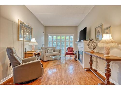 316-2085 Amherst Heights Drive, Burlington, ON - Indoor Photo Showing Living Room With Fireplace