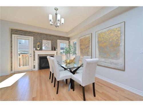 3898 Koenig Road, Burlington, ON - Indoor Photo Showing Dining Room With Fireplace