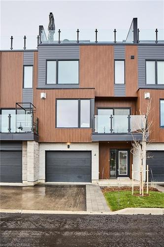 4-117 Sladden Court, Thornbury, ON - Outdoor With Facade