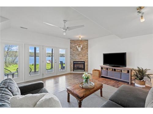 121 North Deer Lake Road, Port Sydney, ON - Indoor Photo Showing Living Room With Fireplace