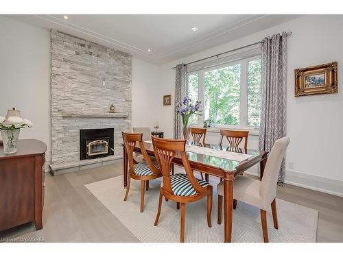 3136 Limestone Road, Campbellville, ON - Indoor Photo Showing Dining Room With Fireplace