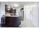 422-33 Whitmer Street, Milton, ON  - Indoor Photo Showing Kitchen With Upgraded Kitchen 