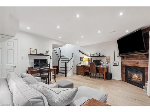 2329 Marine Drive, Oakville, ON - Indoor Photo Showing Living Room With Fireplace