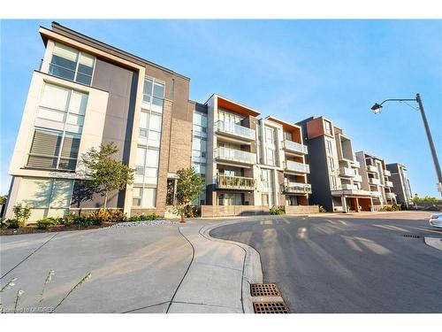 314-3028 Creekshore Common, Oakville, ON - Outdoor With Balcony With Facade