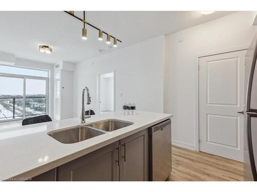 1001-450 Dundas Street E, Waterdown, ON - Indoor Photo Showing Kitchen With Double Sink