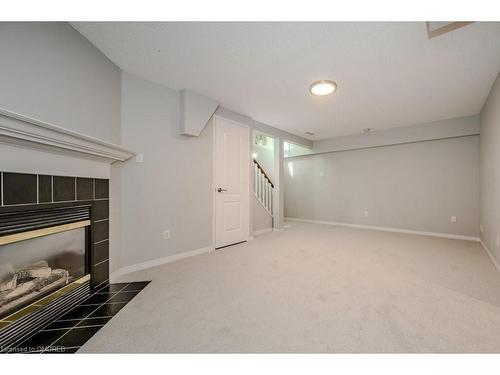 48B-1084 Queen Street W, Mississauga, ON - Indoor With Fireplace