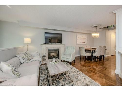 48B-1084 Queen Street W, Mississauga, ON - Indoor Photo Showing Living Room With Fireplace