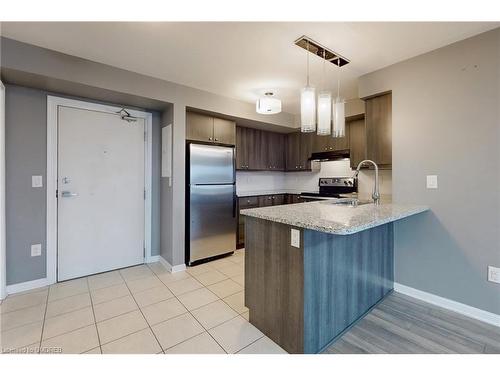 305-1005 Nadalin Heights, Halton, ON - Indoor Photo Showing Kitchen With Stainless Steel Kitchen With Upgraded Kitchen