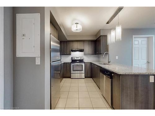 305-1005 Nadalin Heights, Halton, ON - Indoor Photo Showing Kitchen With Stainless Steel Kitchen With Upgraded Kitchen