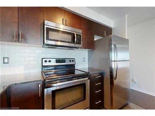 709-1940 Ironstone Drive, Burlington, ON - Indoor Photo Showing Kitchen With Stainless Steel Kitchen With Upgraded Kitchen