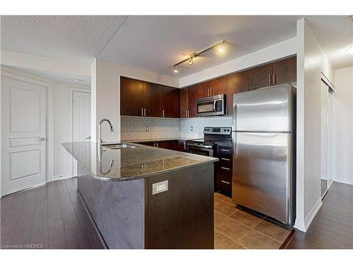 709-1940 Ironstone Drive, Burlington, ON - Indoor Photo Showing Kitchen With Stainless Steel Kitchen