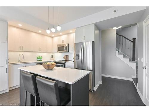 7-145 Long Branch Avenue, Etobicoke, ON - Indoor Photo Showing Kitchen With Stainless Steel Kitchen With Upgraded Kitchen