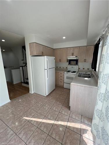 122-1168 Arena Road, Mississauga, ON - Indoor Photo Showing Kitchen With Double Sink