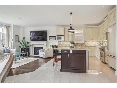 2447 Chateau Common, Oakville, ON - Indoor Photo Showing Kitchen With Fireplace With Upgraded Kitchen