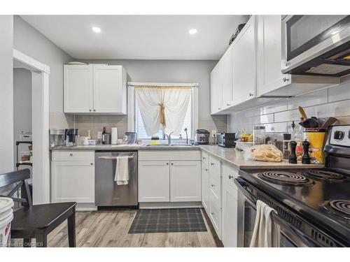 14 Manning Street, St. Catharines, ON - Indoor Photo Showing Kitchen With Double Sink