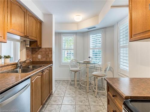 209-2301 Parkhaven Boulevard, Oakville, ON - Indoor Photo Showing Kitchen With Double Sink