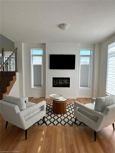 14 Tran Street, Wasaga Beach, ON - Indoor Photo Showing Living Room With Fireplace