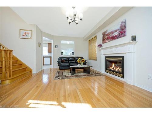 28 Eagleview Way, Georgetown, ON - Indoor Photo Showing Living Room With Fireplace