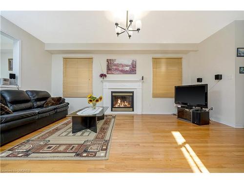 28 Eagleview Way, Georgetown, ON - Indoor Photo Showing Living Room With Fireplace