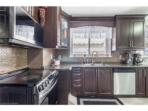 9 Seguin Court, Etobicoke, ON - Indoor Photo Showing Kitchen With Stainless Steel Kitchen With Double Sink With Upgraded Kitchen