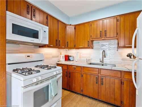 27 Villella Road, Lowbanks, ON - Indoor Photo Showing Kitchen With Double Sink