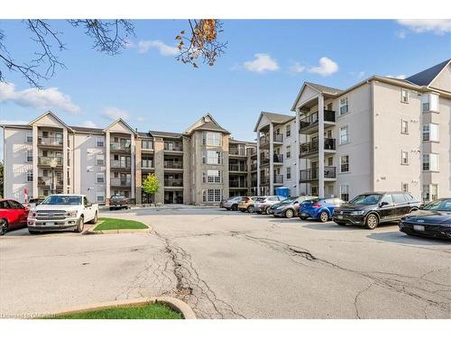 209-1411 Walker'S Line, Burlington, ON - Outdoor With Balcony With Facade