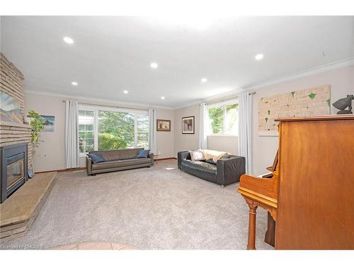 520 Concession 3 Road, Wilsonville, ON - Indoor Photo Showing Living Room With Fireplace